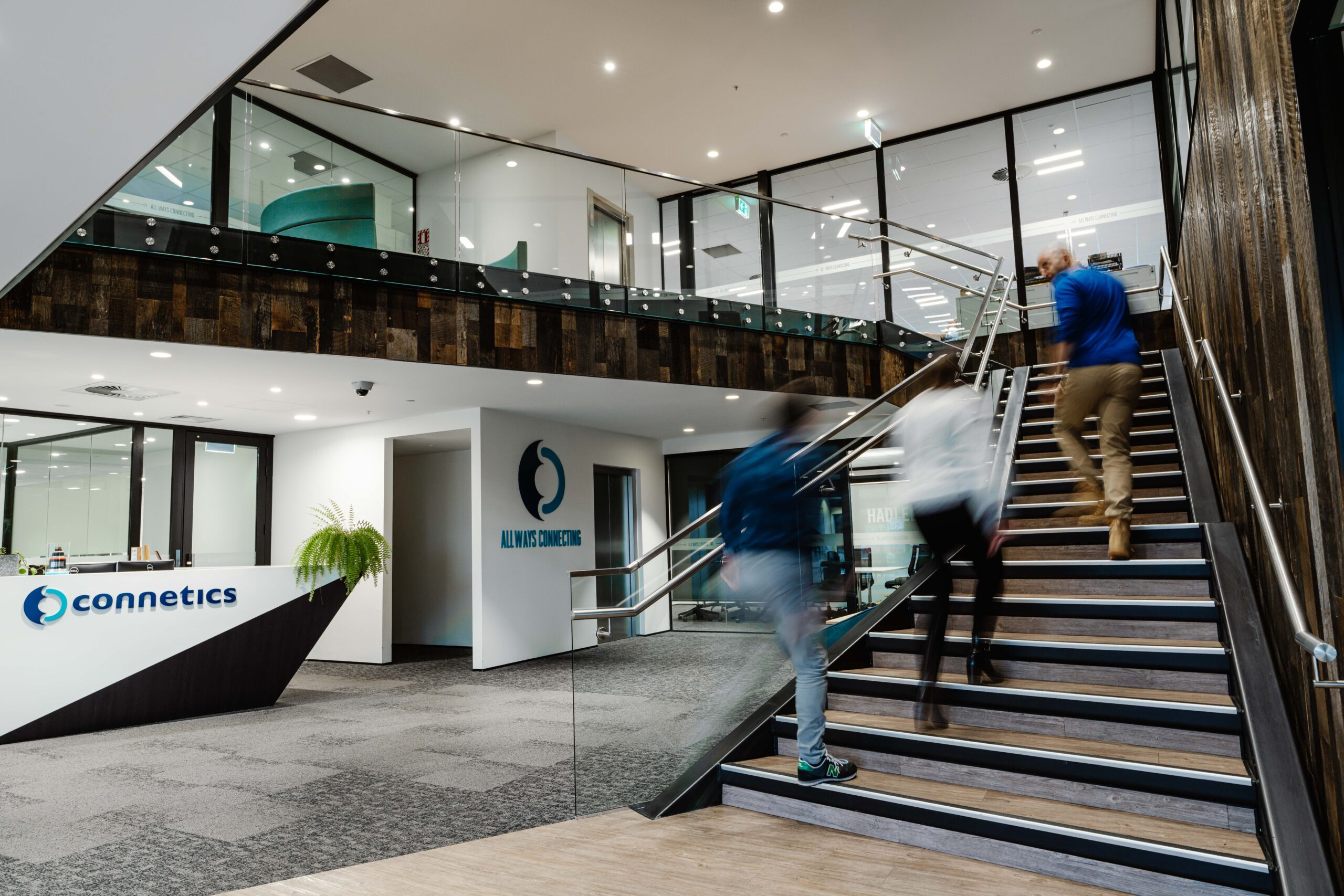 employees waking up stairs