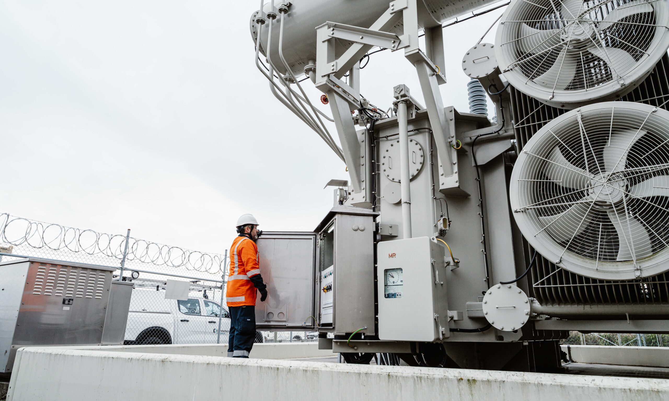 a connetics worker inspects a substation