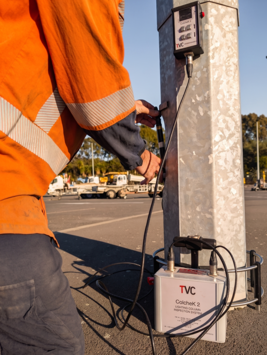 Joe tests a pole with nondestructive testing